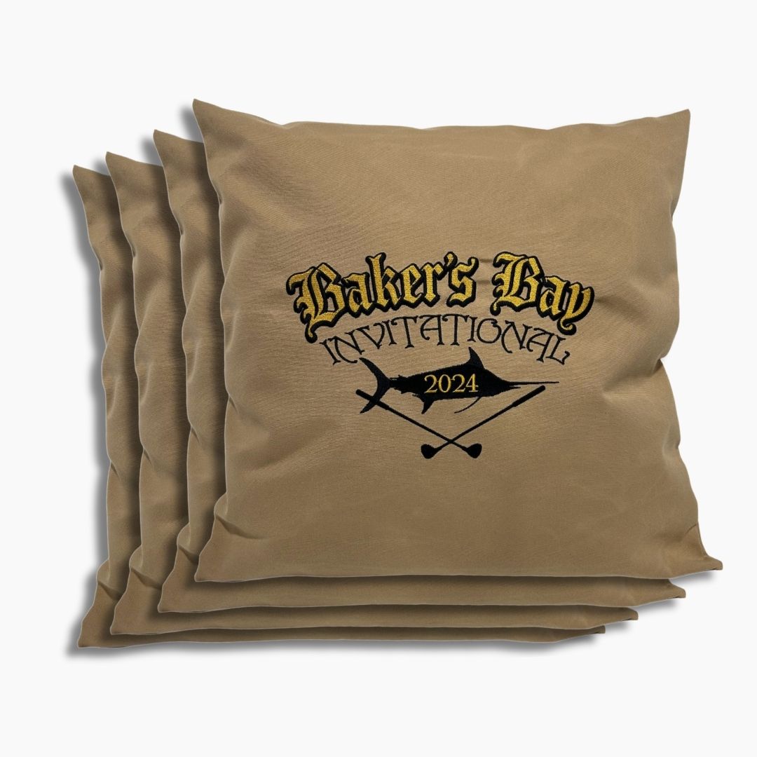 Tan brown sunbrella weighted boat pillow with 'Baker's Bay Invitational 2024' text and fish design - 4 Pack