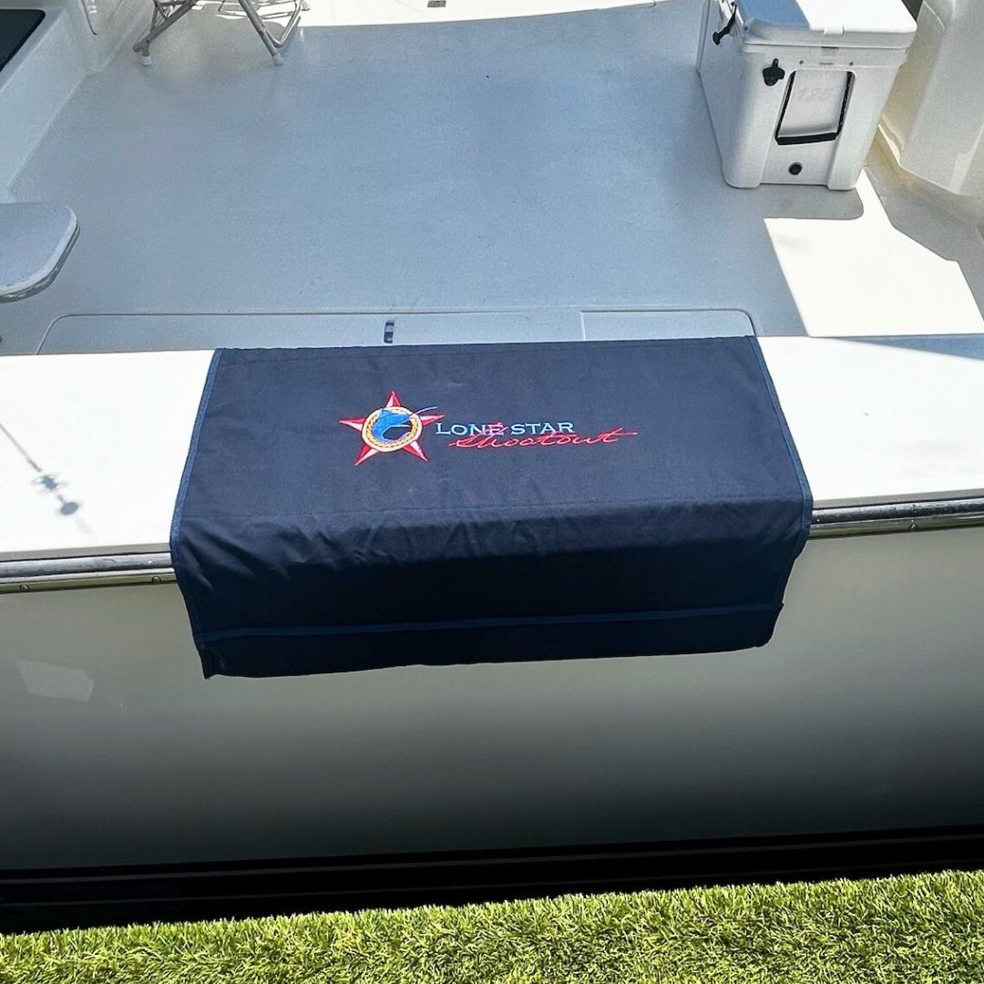Embroidered Sunbrella Custom BoatMat Gunnel Boarding Mat with the Lone Star Shootout logo on a Sportfish Boat.
