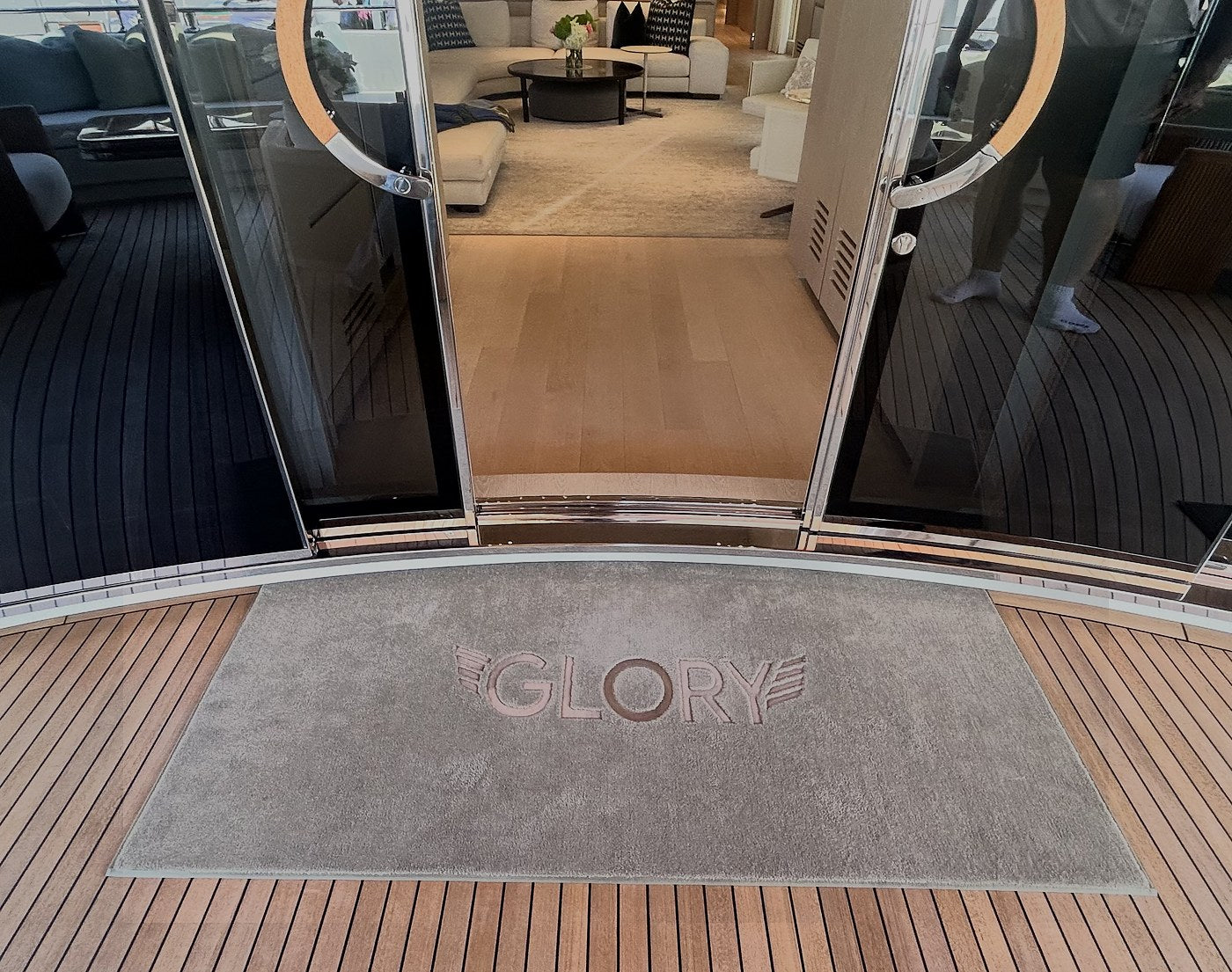 Glory custom embroidered carpet deck mat on superyacht — BoatMat Corporation